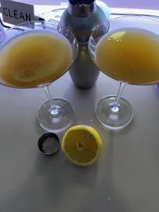 The Sidecar Cocktail x2 by a cobbler shaker and lemon half